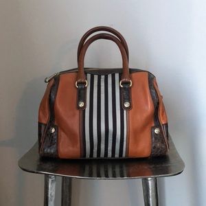 Limited edition henri Bendel barrel bag
